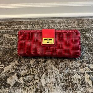 J. Crew red woven rattan clutch bag with a leather flap and gold- tone turnlock